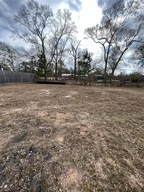 Exterior - 14952 Forest Castle Rd, Conroe, TX 77306 photo 7 of 10