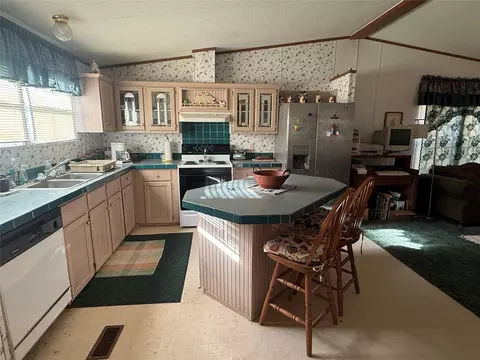 Kitchen - 305 Canadian Dr, Trinity, TX 75862 photo 2 of 2