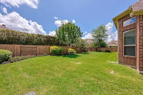 Exterior - 515 Mill Creek Rd, Pinehurst, TX 77362 photo 7 of 8
