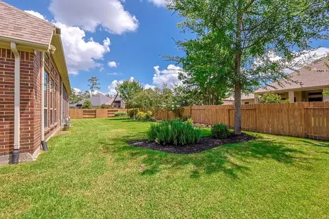 Exterior - 515 Mill Creek Rd, Pinehurst, TX 77362 photo 6 of 8