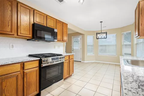 Kitchen - 4414 Bridgevillage Dr, Spring, TX 77373 photo 5 of 10