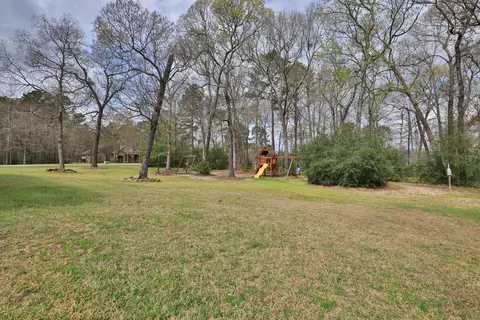 Exterior - 1547 Ruby Dr, Willis, TX 77378 photo 7 of 12