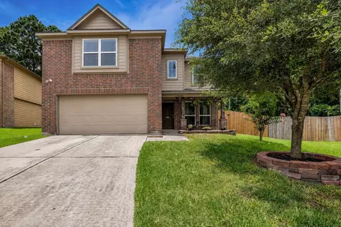 Exterior - 16718 Warbler Dr, Conroe, TX 77385 photo 2 of 11