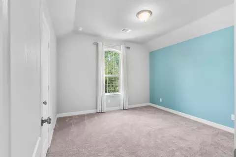 Bedroom - 135 Teralyn Grove Loop, Willis, TX 77318 photo 10 of 10
