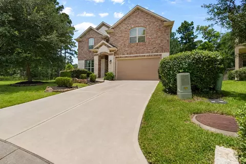 Exterior - 135 Teralyn Grove Loop, Willis, TX 77318 photo 5 of 7
