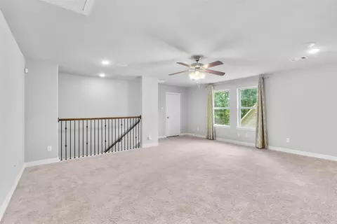 Living - 135 Teralyn Grove Loop, Willis, TX 77318 photo 4 of 4