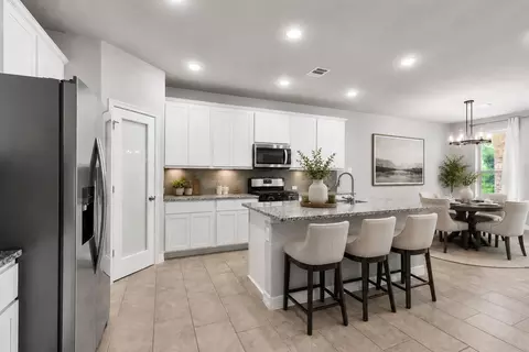 Kitchen - 135 Teralyn Grove Loop, Willis, TX 77318 photo 1 of 3