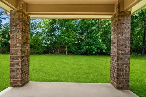 Exterior - 135 Teralyn Grove Loop, Willis, TX 77318 photo 4 of 7