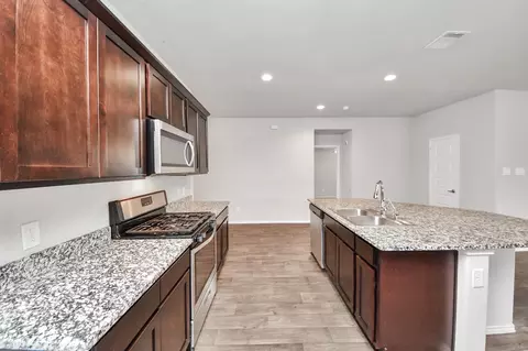 Kitchen - 1715 Bear Spring Dr, Booth, TX 77469 photo 3 of 4