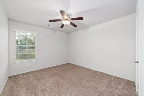 Bedroom - 14005 Silver Falls Ct, Conroe, TX 77384 photo 4 of 5