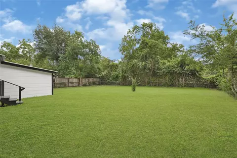 Exterior - 1202 N Roberson St, Conroe, TX 77301 photo 7 of 12