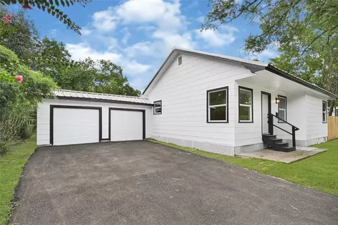 Exterior - 1202 N Roberson St, Conroe, TX 77301 photo 9 of 12