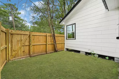 Exterior - 1202 N Roberson St, Conroe, TX 77301 photo 3 of 12
