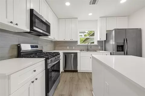 Kitchen - 1202 N Roberson St, Conroe, TX 77301 photo 4 of 6