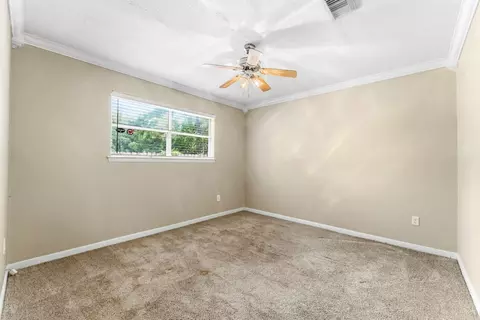 Bedroom - 10820 Longleaf Dr, Conroe, TX 77385 photo 2 of 4