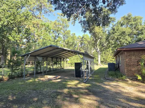 Exterior - 10094 Stidham Rd, Conroe, TX 77302 photo 6 of 17