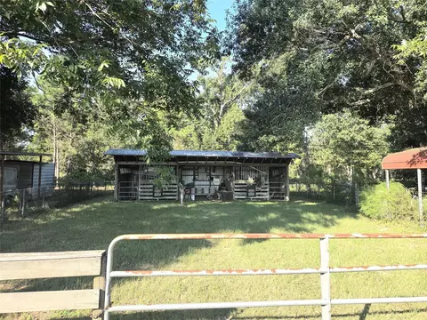 Exterior - 10094 Stidham Rd, Conroe, TX 77302 photo 2 of 17