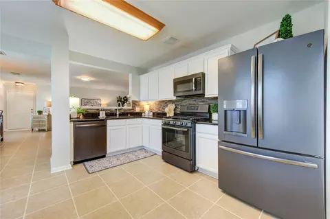 Kitchen - 3010 E Legends Bend Dr, Spring, TX 77386 photo 2 of 5