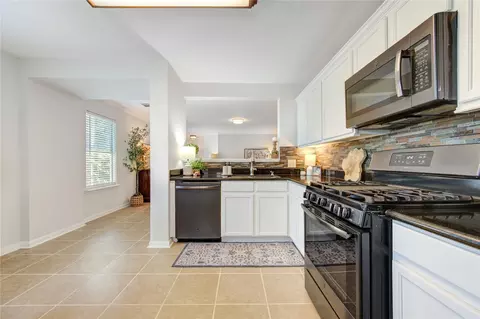 Kitchen - 3010 E Legends Bend Dr, Spring, TX 77386 photo 4 of 5