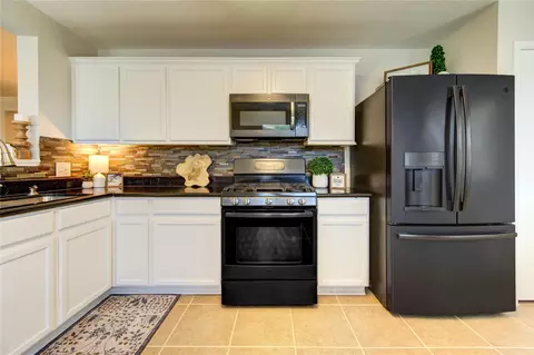 Kitchen - 3010 E Legends Bend Dr, Spring, TX 77386 photo 5 of 5