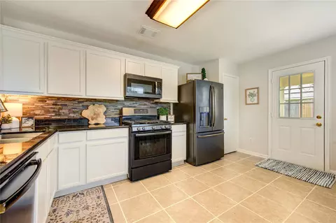 Kitchen - 3010 E Legends Bend Dr, Spring, TX 77386 photo 3 of 5