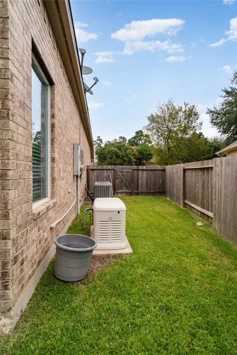 Exterior - 43 N Scribewood Cir, Spring, TX 77382 photo 6 of 7