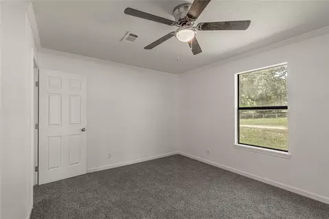 Bedroom - 169 W Sunset Dr, Trinity, TX 75862 photo 8 of 11