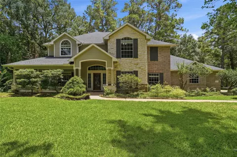 Exterior - 8766 Skyline Ln, Conroe, TX 77302 photo 3 of 9