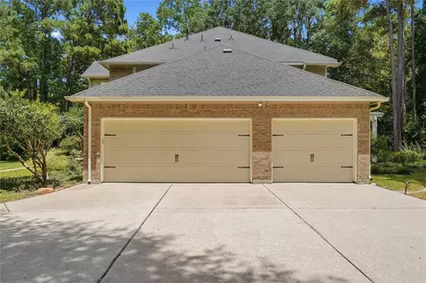 Exterior - 8766 Skyline Ln, Conroe, TX 77302 photo 7 of 9