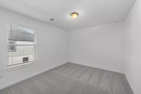 Bedroom - 76 Shining Point Dr, Waller, TX 77484 photo 3 of 6