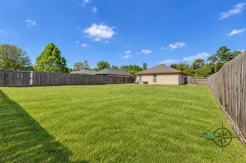 Exterior - 8825 E Buffalo Cir, Willis, TX 77378 photo 5 of 7