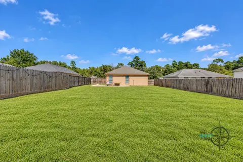 Exterior - 8825 E Buffalo Cir, Willis, TX 77378 photo 4 of 7