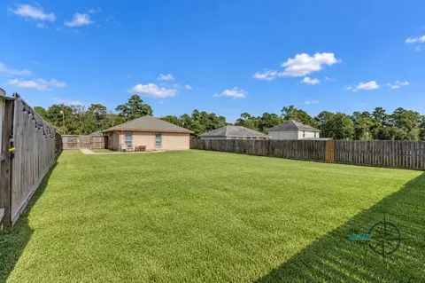 Exterior - 8825 E Buffalo Cir, Willis, TX 77378 photo 3 of 7
