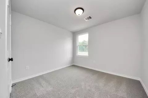 Bedroom - 12825 Naval Dr, Conroe, TX 77306 photo 3 of 9