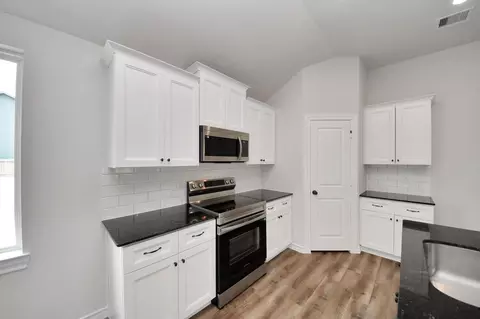 Kitchen - 12825 Naval Dr, Conroe, TX 77306 photo 3 of 4