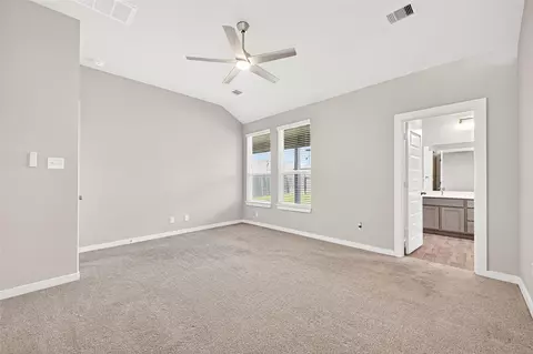 Bedroom - 305 E Tranquil Fields Ln, Waller, TX 77484 photo 6 of 17