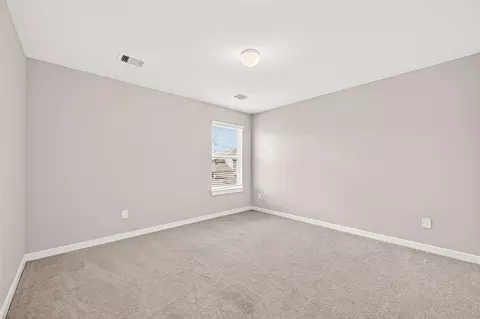 Bedroom - 305 E Tranquil Fields Ln, Waller, TX 77484 photo 14 of 17