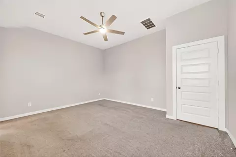 Bedroom - 305 E Tranquil Fields Ln, Waller, TX 77484 photo 5 of 17