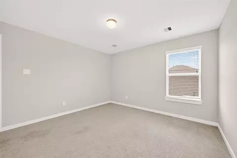 Bedroom - 305 E Tranquil Fields Ln, Waller, TX 77484 photo 16 of 17