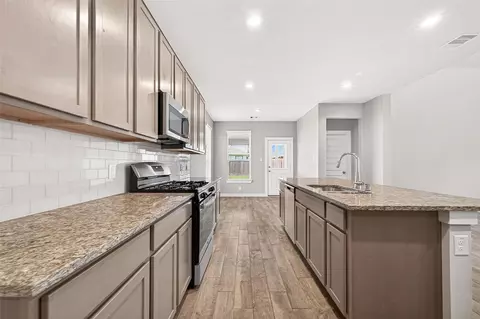Kitchen - 305 E Tranquil Fields Ln, Waller, TX 77484 photo 3 of 4
