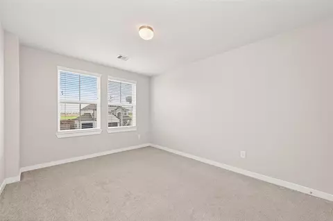 Bedroom - 305 E Tranquil Fields Ln, Waller, TX 77484 photo 11 of 17