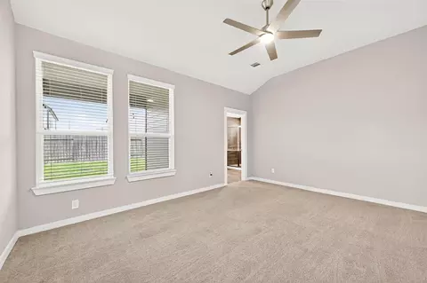 Bedroom - 305 E Tranquil Fields Ln, Waller, TX 77484 photo 4 of 17