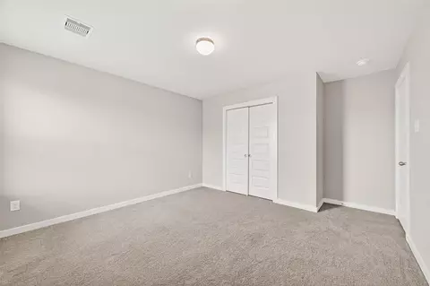 Bedroom - 305 E Tranquil Fields Ln, Waller, TX 77484 photo 15 of 17