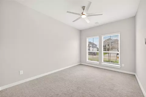 Bedroom - 305 E Tranquil Fields Ln, Waller, TX 77484 photo 1 of 17