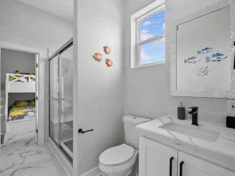 Bath - 1018 Seashell Dr, Surfside Beach, TX 77541 photo 2 of 5