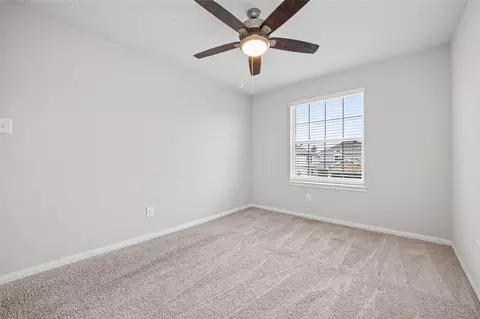 Bedroom - 4818 Blue Jacaranda Way, Spring, TX 77373 photo 7 of 11