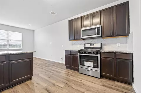 Kitchen - 4818 Blue Jacaranda Way, Spring, TX 77373 photo 2 of 2