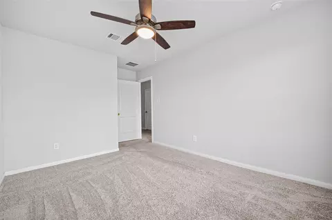 Bedroom - 4818 Blue Jacaranda Way, Spring, TX 77373 photo 6 of 11