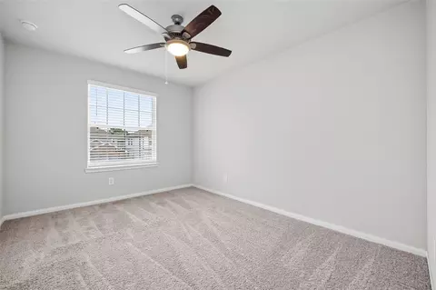 Bedroom - 4818 Blue Jacaranda Way, Spring, TX 77373 photo 4 of 11