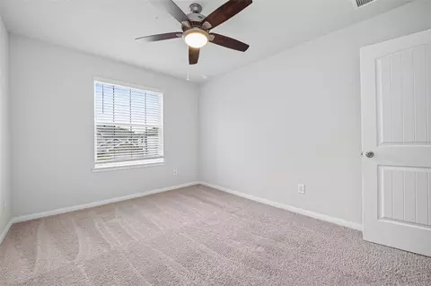 Bedroom - 4818 Blue Jacaranda Way, Spring, TX 77373 photo 9 of 11